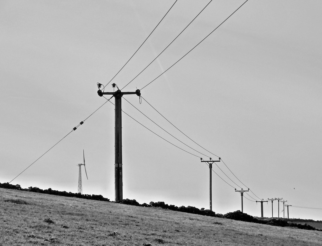 Electricity grid power station — the physical backbone of empire-scale AI compute