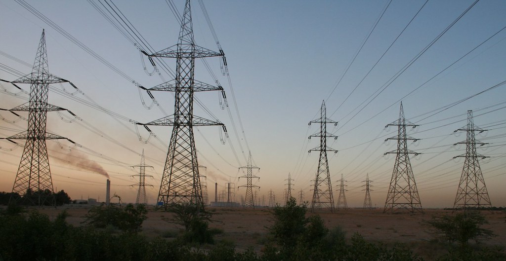 Power lines energy infrastructure — the hidden layer beneath AI compute expansion