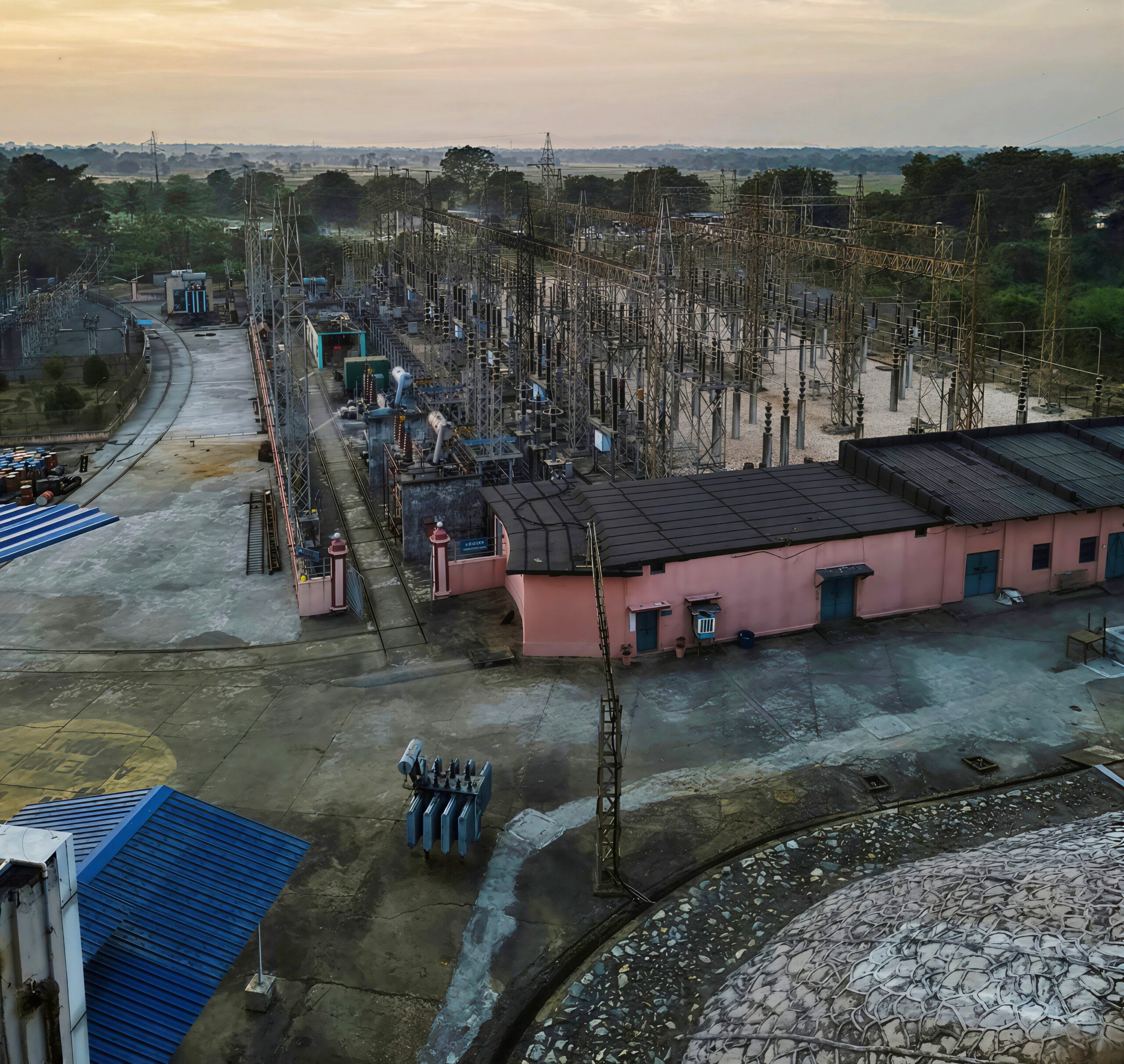 A power substation — the physical interface between high-voltage transmission and the distribution systems that feed data centers, and the site of the transformer bottleneck constraining AI infrastructure buildout